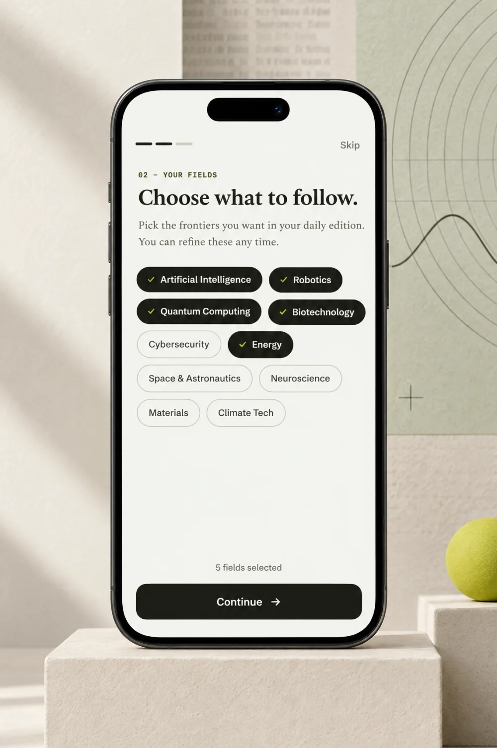 Onboarding, your fields: choose what to follow, on a phone on a stepped plinth