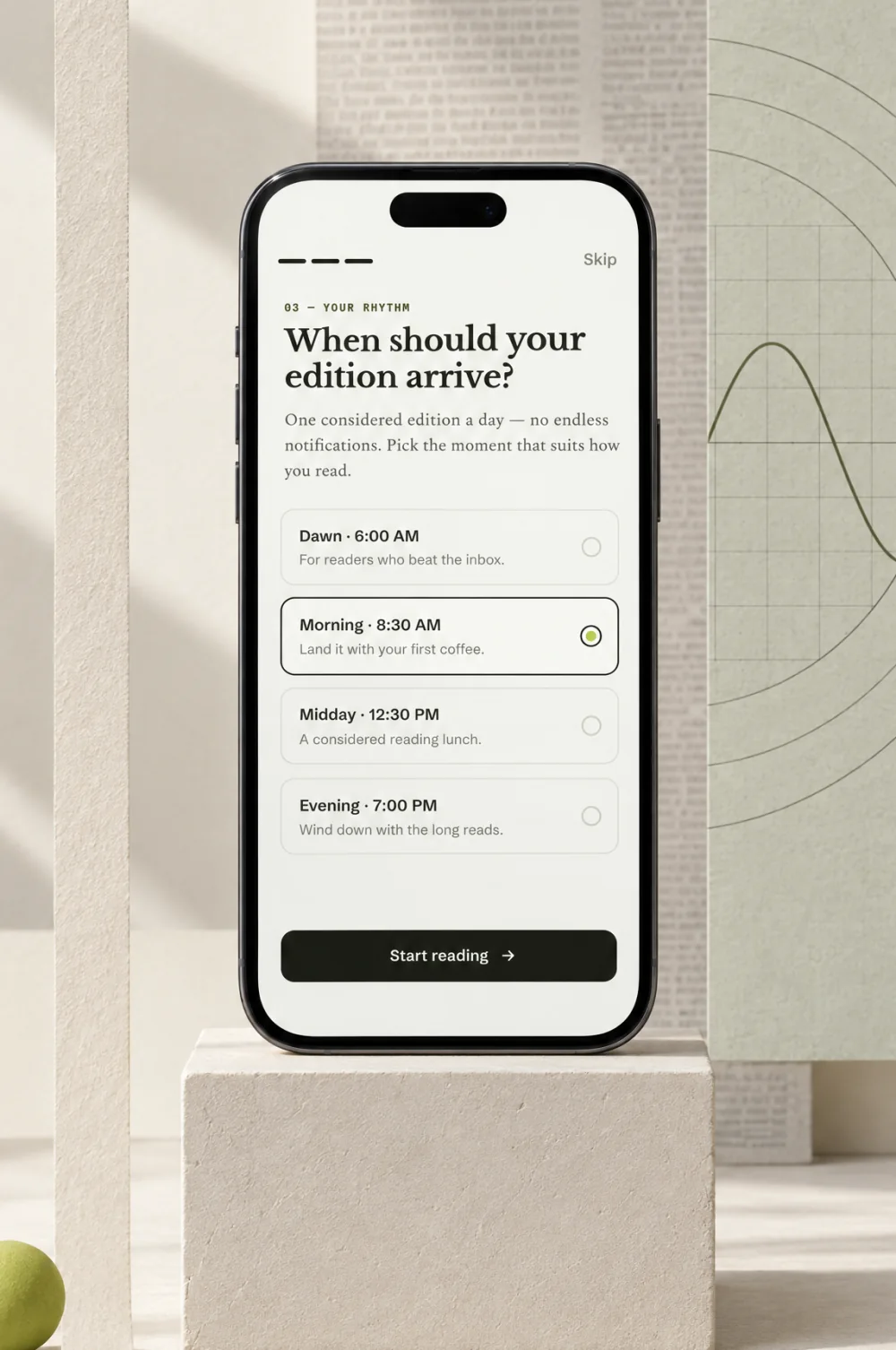 Onboarding, your rhythm: when your edition should arrive, on a phone on a plinth